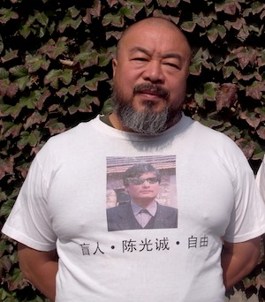 Artist Ai Wei Wei wears a 'free Chen GUangcheng' t-shirt